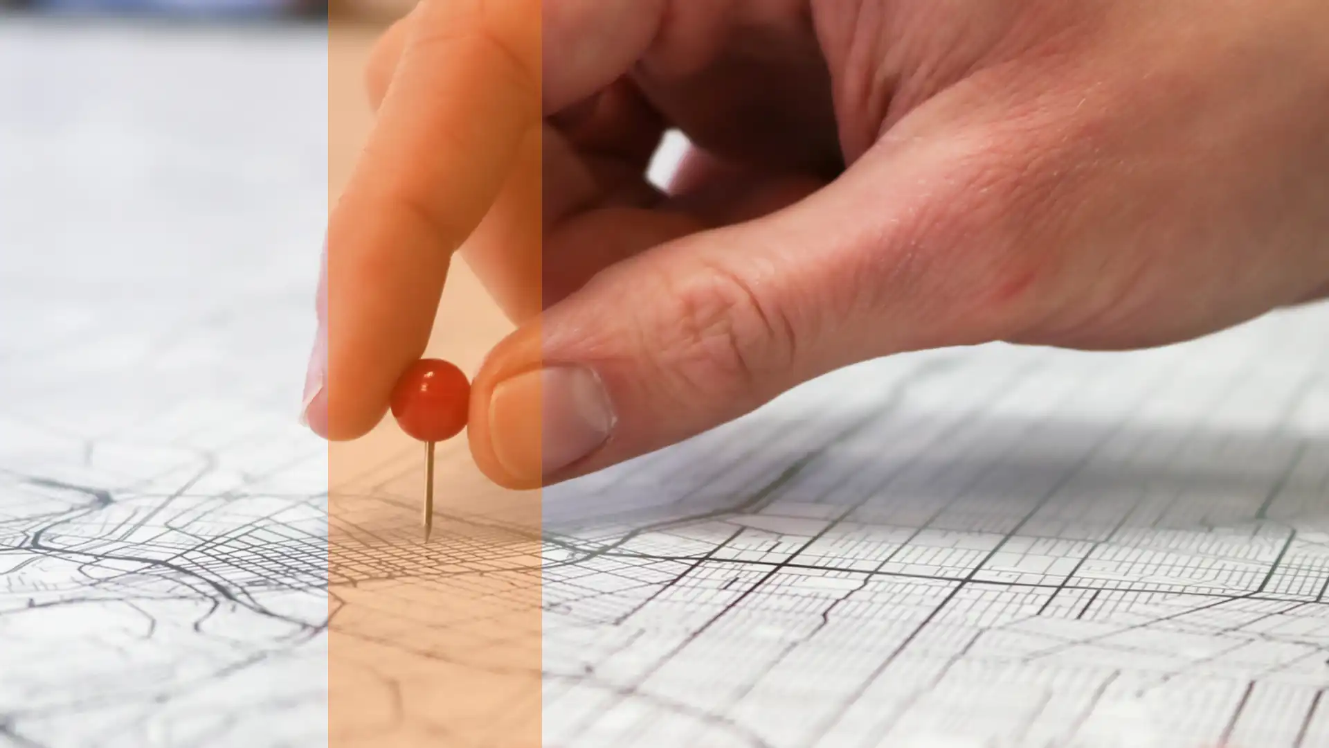 link to g p s monitoring page using thumbnail photo of a hand sticking a pin into a map of a city