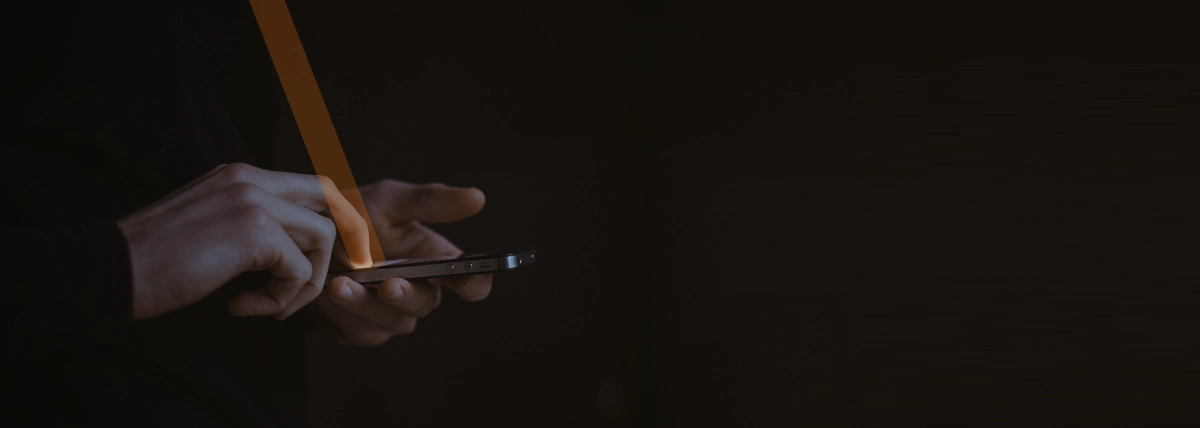 background image of a hand using an iphone
