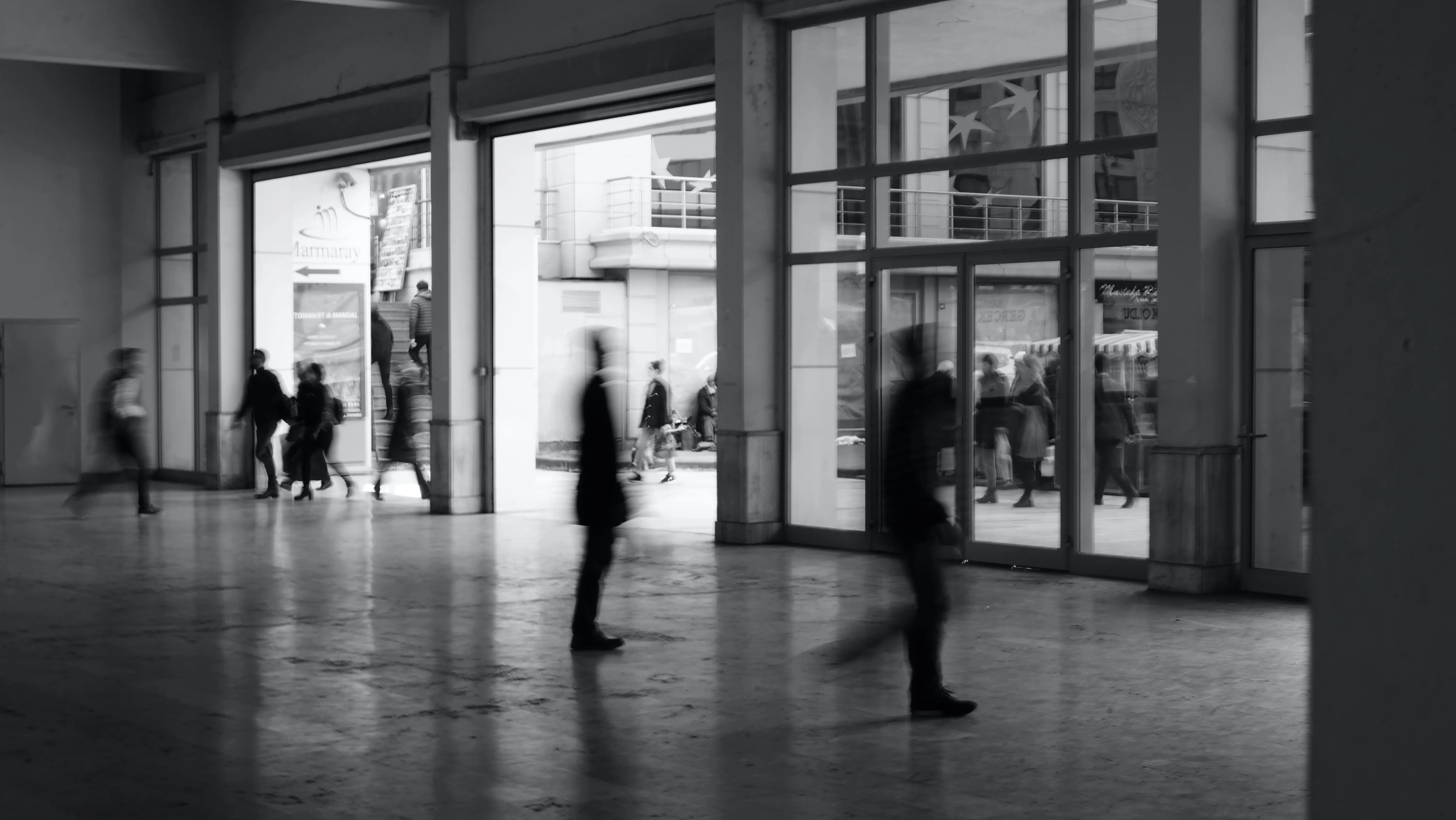 blurry photo of the large entryway of a commercial building